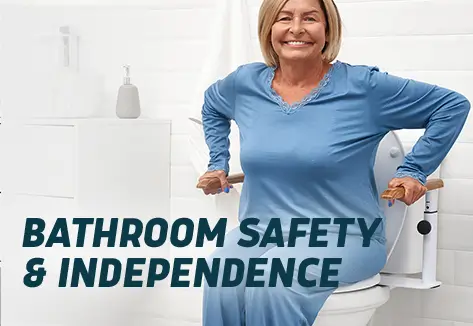 Browse bathroom safety products – Elderly woman using grab bars on a toilet